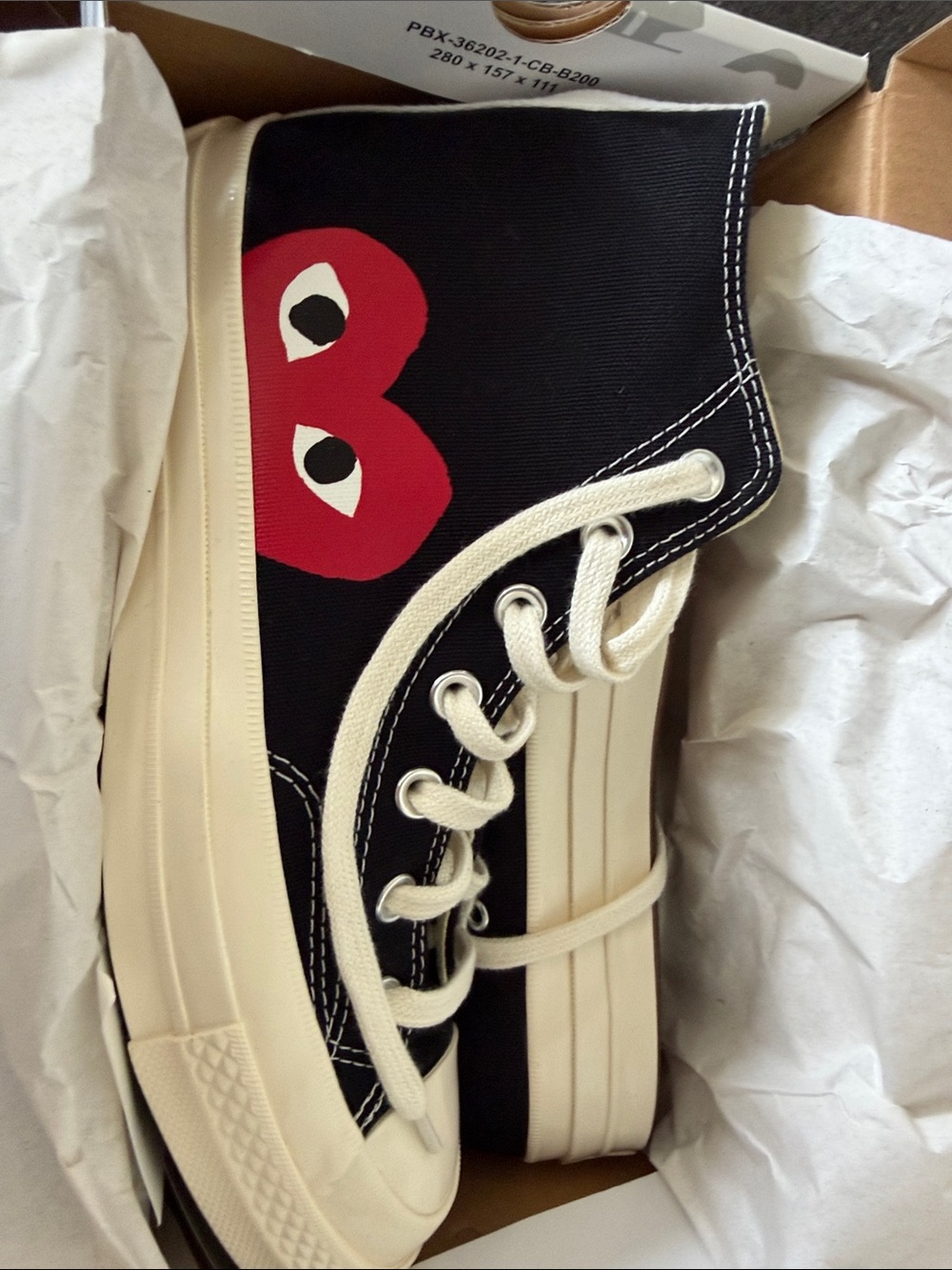 Comme des Garcons Black High-Top Sneakers with Red Heart Graphic